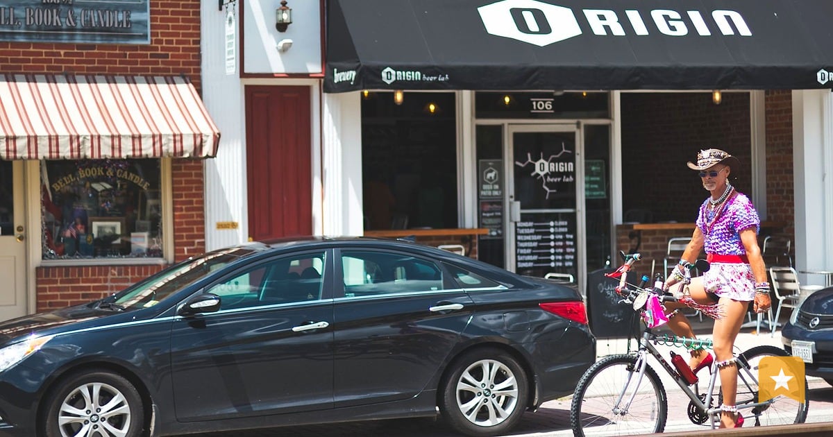 Main Street storefront with brick facade and dark awning